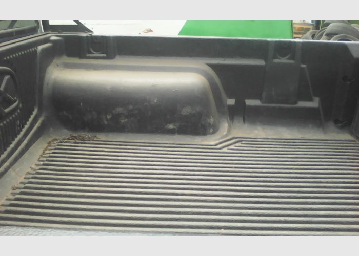 A USED NISSAN HARDBODY PICKUP