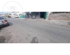 MAIN ROAD WITH FREEHOLD DOCUMENTS PLOT AT KANESHIE