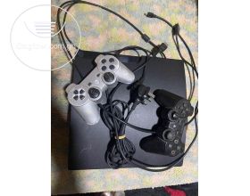 PS3 with two game pads.