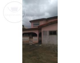 REGISTERED 5 MASTER BEDROOM STOREY HOUSE ON 1 AND HALF PLOTS AT POBIMAN AMASAMAN